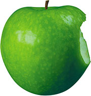 Надкусанное темно-зеленое яблоко