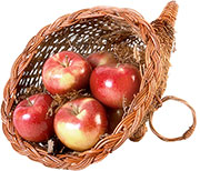Красные яблоки в корзинке в виде рога изобилия